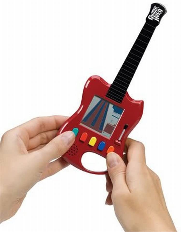 Guitar Hero Handheld Electronic Game Carabiner 2007 BFI 1664 Travel Pocket Size for sale online 